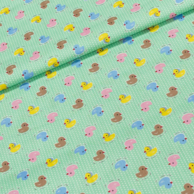 Bavlněné plátno dětské kačenky na světle zelené, š.160cm (látka v metráži)