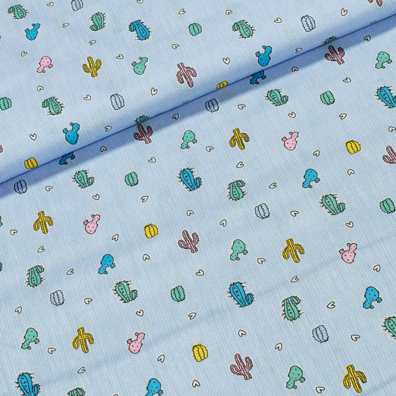 Bavlněné plátno barevné kaktusy na světle modré, š.160cm (látka v metráži)