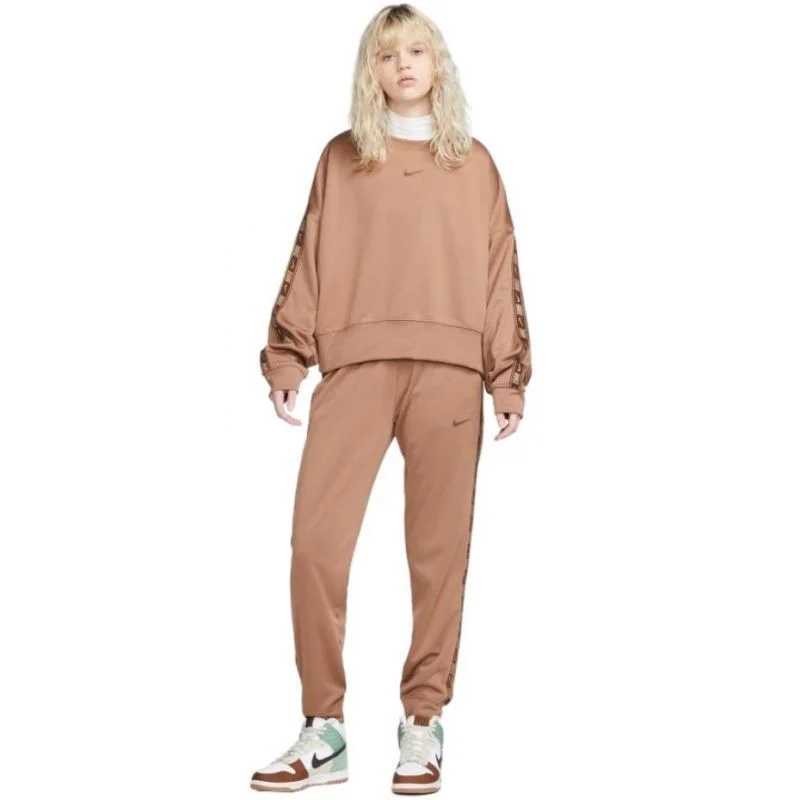 Dámské tepláky Nsw PK Tape Reg W DM4645 256 - Nike L
