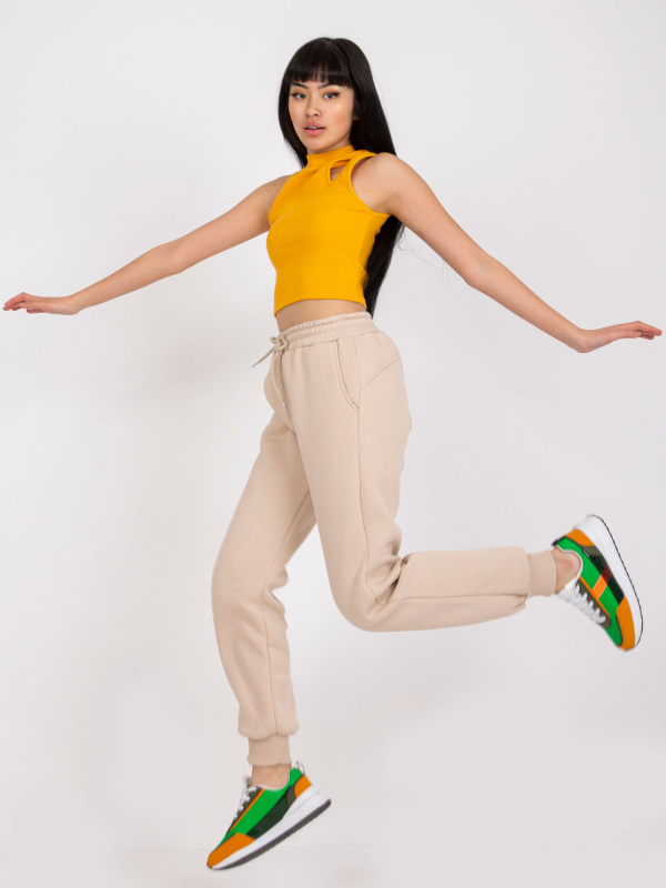 Dámské tepláky EM-DR-712.39P ex moda Barva: Béžová, Velikost: UNI