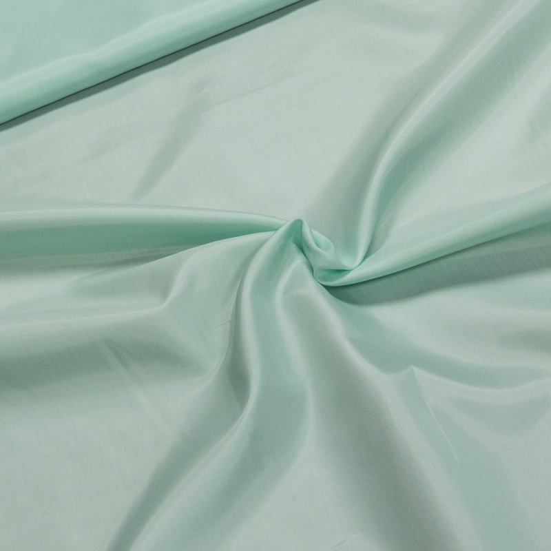 Podšívka polyesterová 55, jednobarevná světle zelená, š.150cm (látka v metráži)