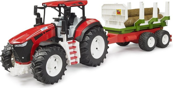 Traktor s přívěsem na klády