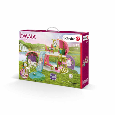 Schleich Třpytivý květinový dům s jednorožci, jezerem a stájí