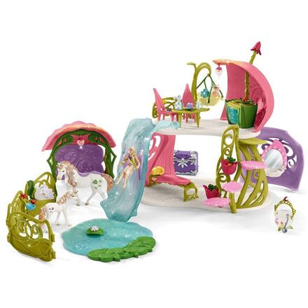 Schleich Třpytivý květinový dům s jednorožci, jezerem a stájí