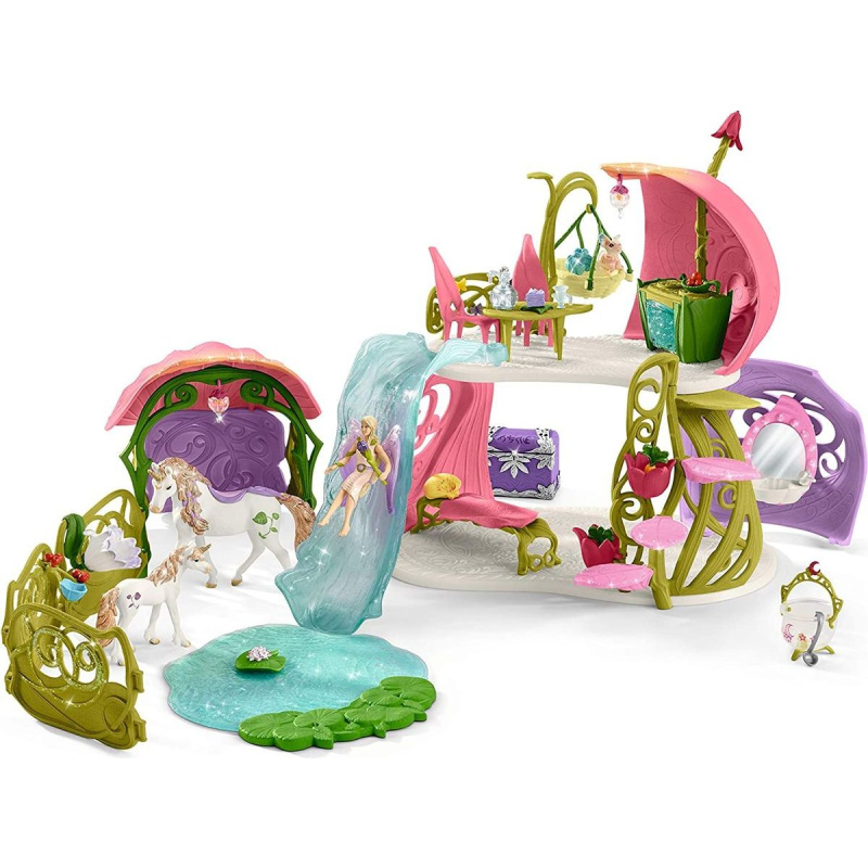 Schleich Třpytivý květinový dům s jednorožci, jezerem a stájí