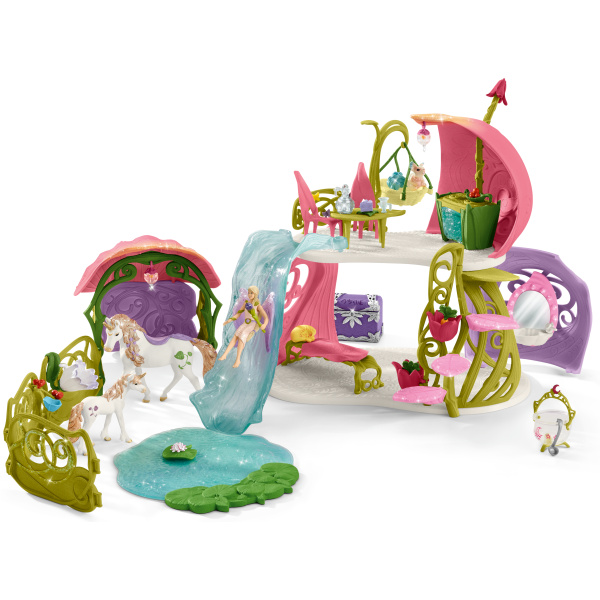 Schleich 42445 Květinový dům s jednorožci, stájí a jezerem