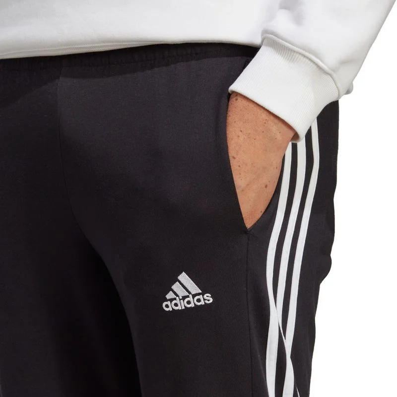 Kalhoty adidas Essentials Single Jersey Tapered Open Hem 3-Stripes M IC0044 2XL