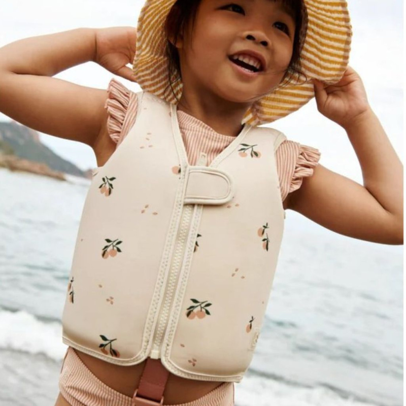 LIEWOOD Plovací vesta Dove - Peach / Sea shell Velikost: 19-30 kg