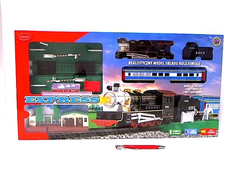 Vláčkodráha Express na baterie se železničním přejezdem