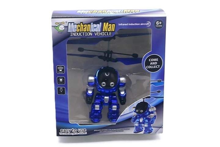 Létající figurka futuristického robota ve zlaté barvě