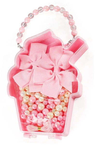 Korálky s ozdobnými mašličkami – sada na výrobu šperků v kabelce ve tvaru cupcake