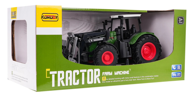 Zelený traktor s drapákem