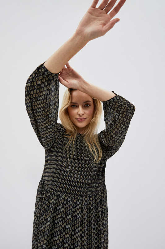 Midi šaty s potiskem.Velikost: XS