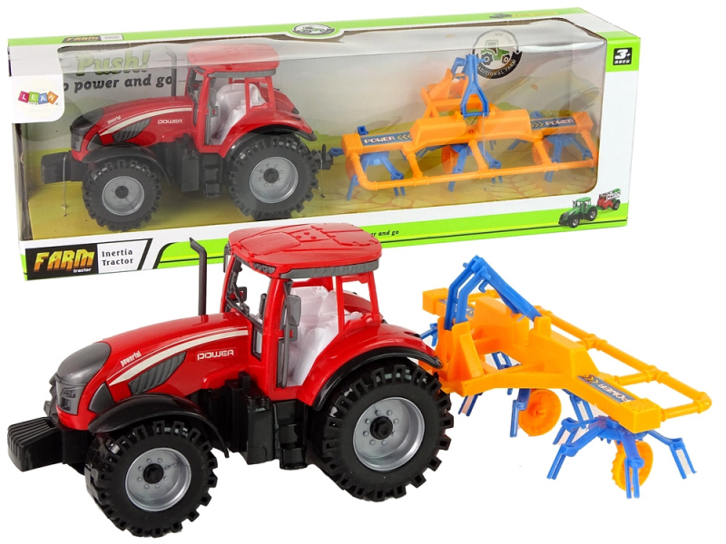 LEANToys Červený traktor s obracečkou na setrvačník