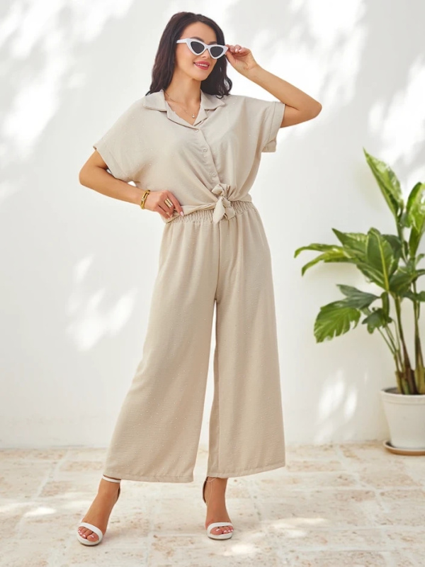 Resti Women's set with a tied short-sleeve shirt and flared pants with rhinestones