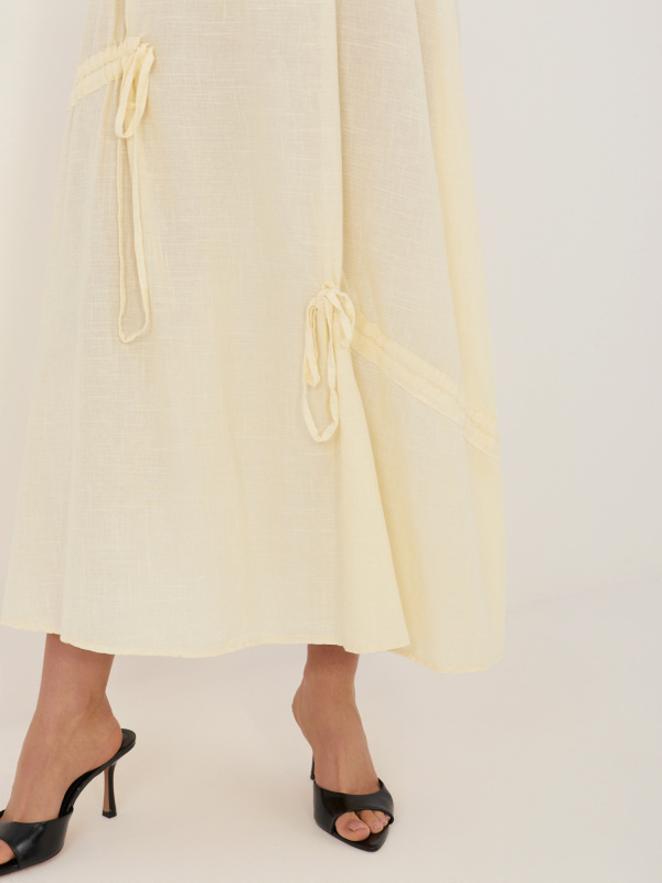 Jasnožlutá letní sukně se stahovači