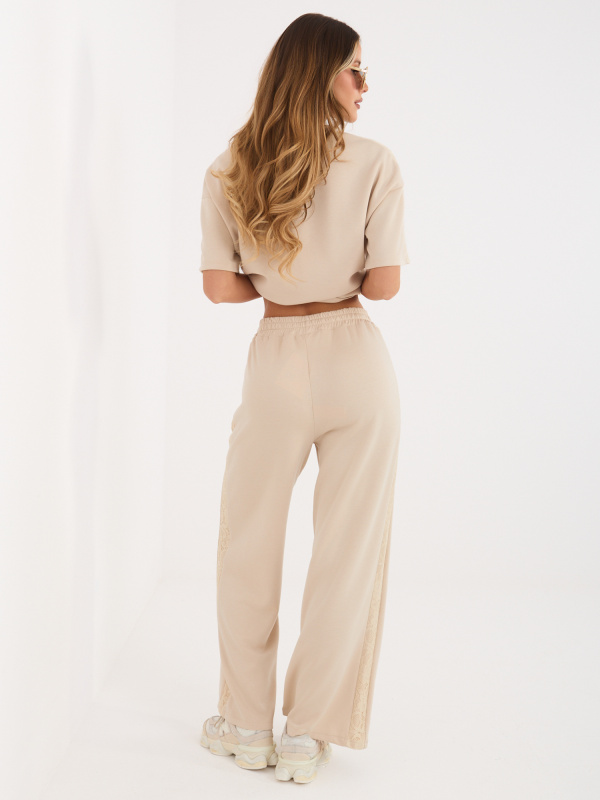 Béžové tepláky s vázáním