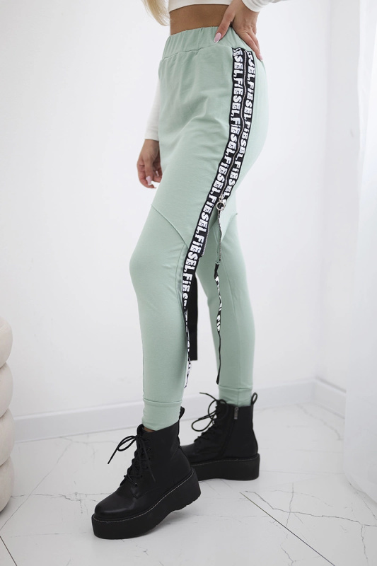 Kalhoty/oblek s nápisem selfie tmavě mátový UNI