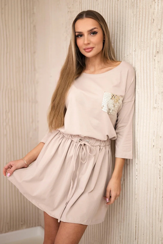 Kesi Flitrové šaty Lacey s kapsami Barva: Béžová, Velikost: UNI