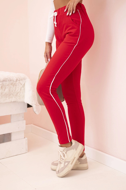 Kesi Dámské tepláky s kapsami a řetízkem béžové Barva: Červená, Velikost: UNI