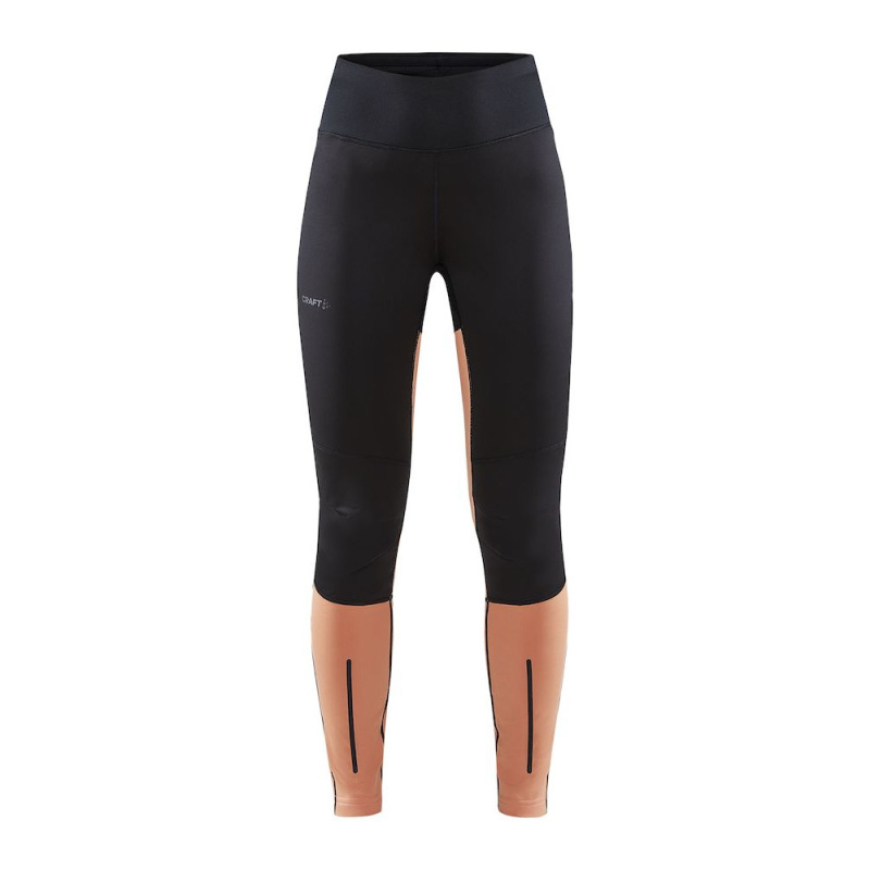 Dámské větruodolné legíny CRAFT ADV Essence Wind Tights černá s oranžovou Velikost: XS