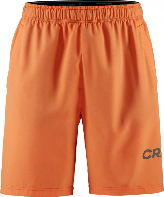 Pánské funkční šortky CRAFT CORE Essence - oranžová Velikost: M