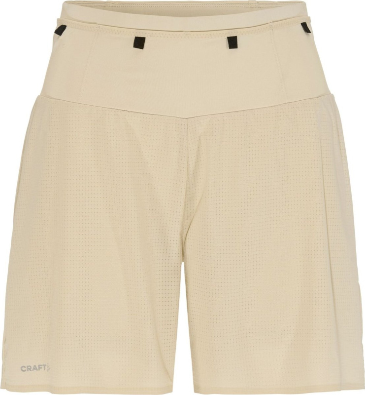 Dámské běžecké šortky CRAFT PRO Trail dámské - béžová Velikost: S