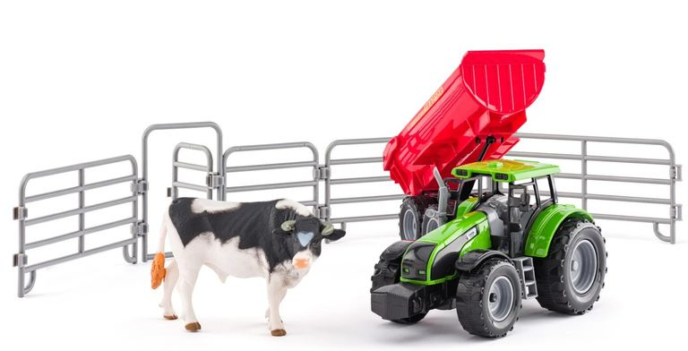 Traktor s přívěsem a býkem se zahradou