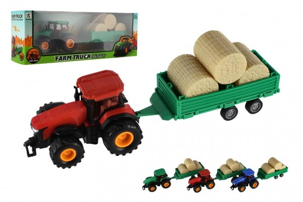Teddies Traktor s vlekem s balíkama plast 30cm na setrvačník 3 barvy v krabici 33x12x9cm
