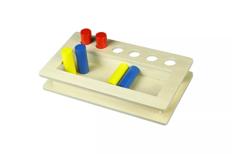 Box na vkládání válečků do otvorů Montessori