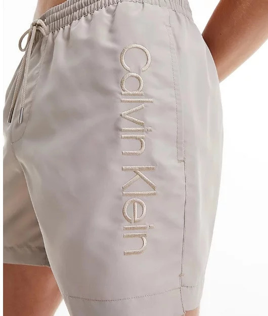 Pánské koupací kraťasy - KM00718 ABM - béžová - Calvin Klein XL béžová