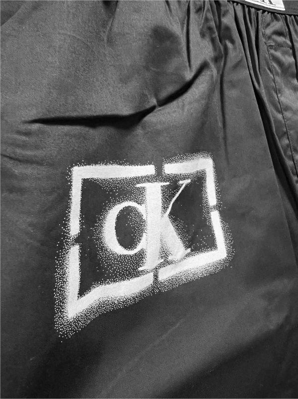 Pánské kalhoty na spaní NM2390E B88 černá s potiskem - Calvin Klein černá s potiskem XL