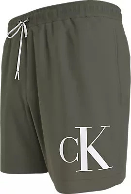 Pánské plavky MEDIUM DRAWSTRING KM0KM01003 LDY olivově zelené - Calvin Klein XL